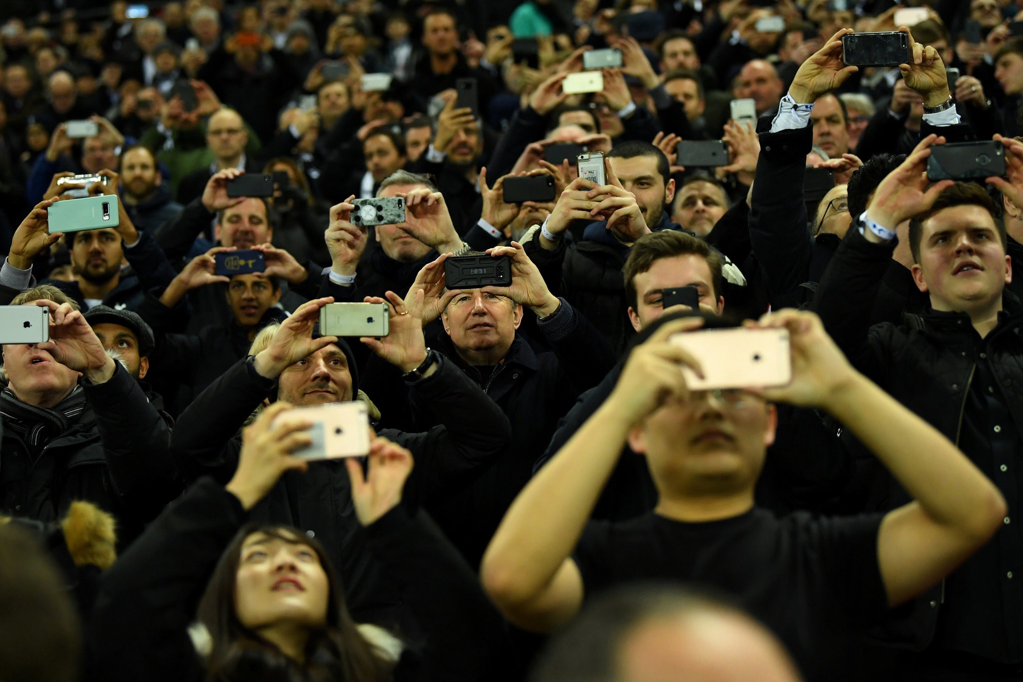 Group of people with phones